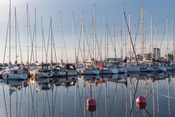 Yachts in Borgholm harbor in calm water in Sweden stock photo