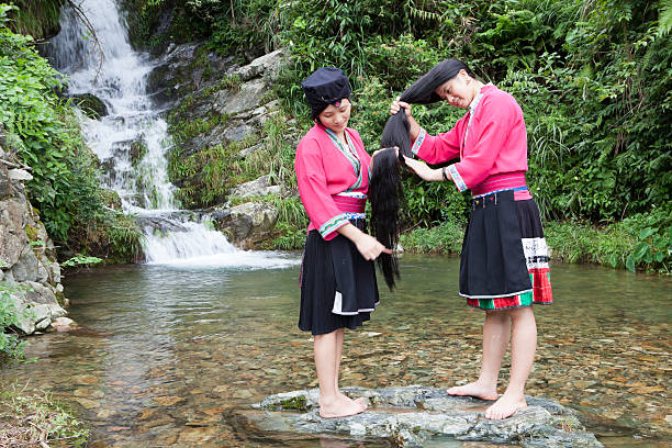 Yao Girls Washing Hair stock photo