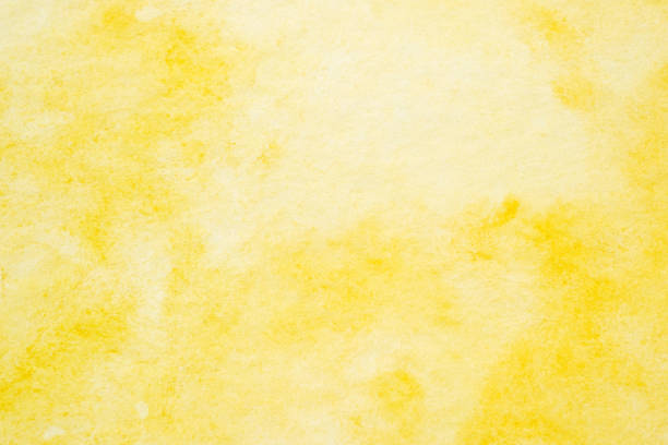 Yellow abstract watercolor painting textured on white paper background stock photo