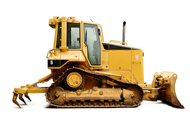 A yellow bulldozer on a white background stock photo