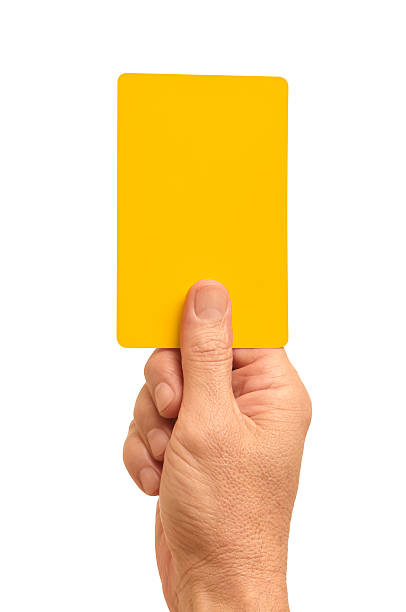 yellow card - gele kaart stockfoto's en -beelden