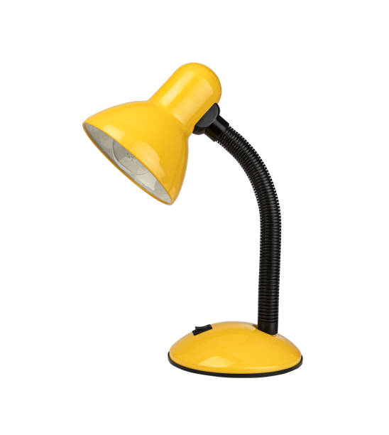 Yellow desk lamp isolated on white background stock photo