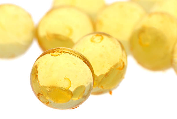 Yellow gel pills stock photo
