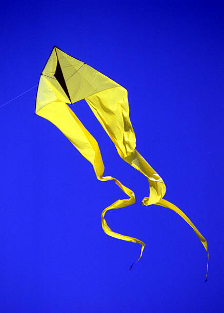 Yellow Kite Blue Sky stock photo