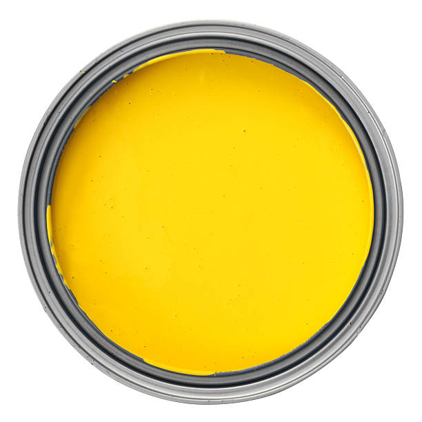 yellow paint can stock photo