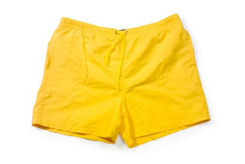 Yellow Pair Of Swim Trunks On White Background Stock Photo - Download ...