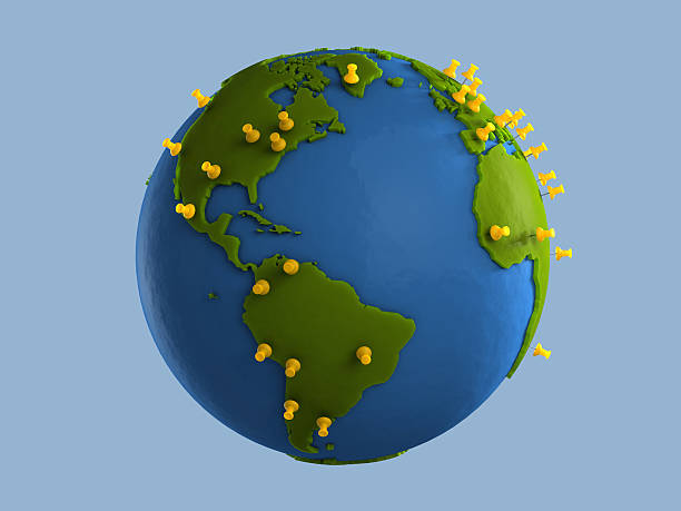 Yellow Tacks Indicate Major Cities on Clay Globe (America) stock photo