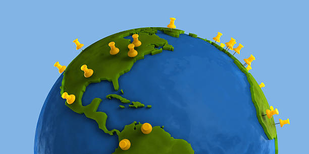 Yellow Tacks Indicate Major City on Clay Globe stock photo