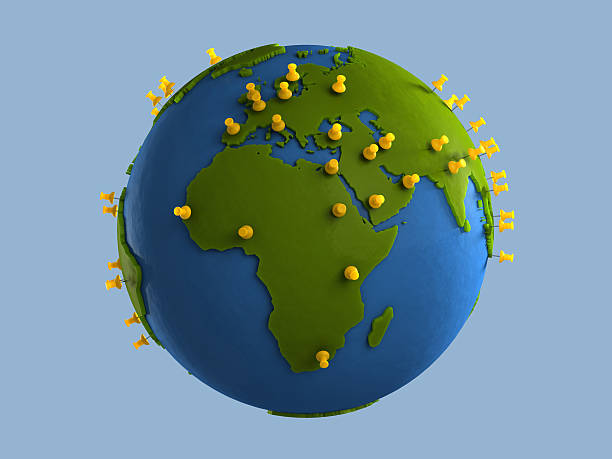 Yellow Tacks on Globe (Africa) stock photo