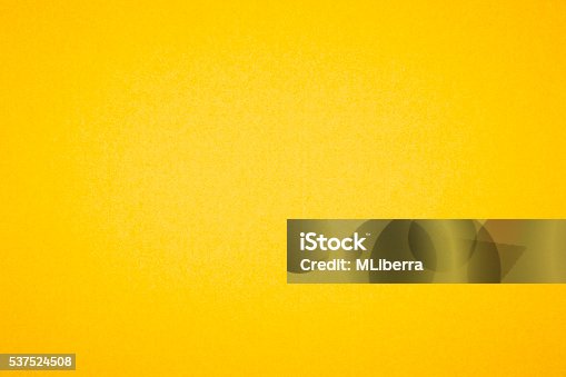istock Yellow textured paper background 537524508