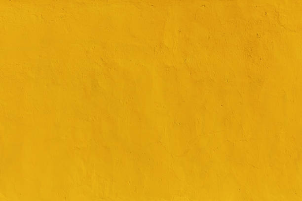 Yellow wall surface texture stock photo