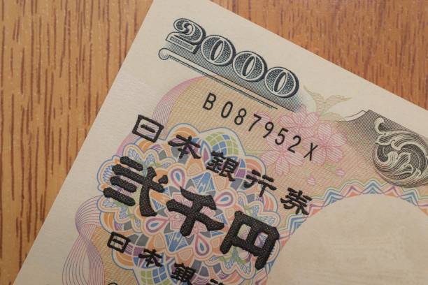 2000 yen bill It is a 2000 yen banknote, which is one of the banknotes with a small amount of circulation in Japan. BANK OF JAPAN   stock pictures, royalty-free photos & images