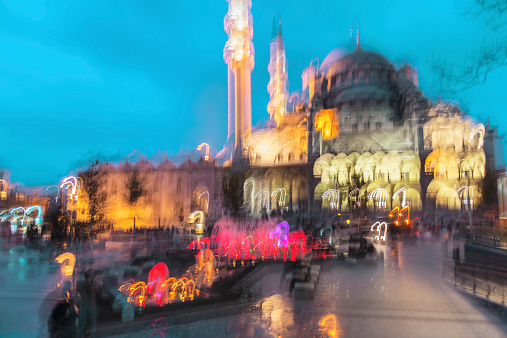Night shot of illuminated Yeni Cami mosque.