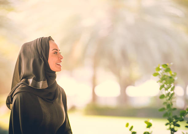 Young Arab Emarati Girl Young Emirati girl in a park. Image taken during iStockalypse 2015, Dubai, United Arab Emirates beautiful arab woman stock pictures, royalty-free photos & images