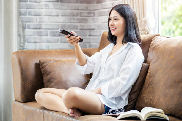 3,261 Asian Woman Watching Tv Stock Photos, Pictures & Royalty-Free Images  - iStock