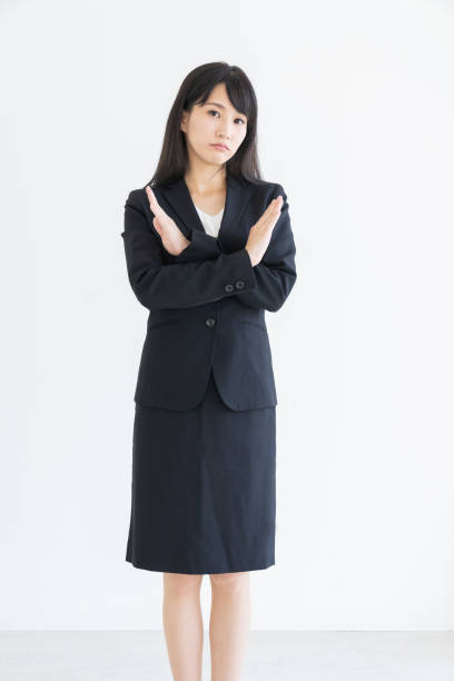 young attractive asian businesswoman to refuse Beautiful young attractive asian businesswoman to refuse how do you say shut up in japanese stock pictures, royalty-free photos & images