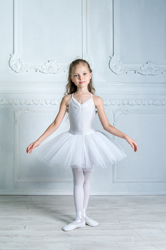 Young Ballerina Sitting On Wooden Chair Stock Photo - Download Image Now - iStock