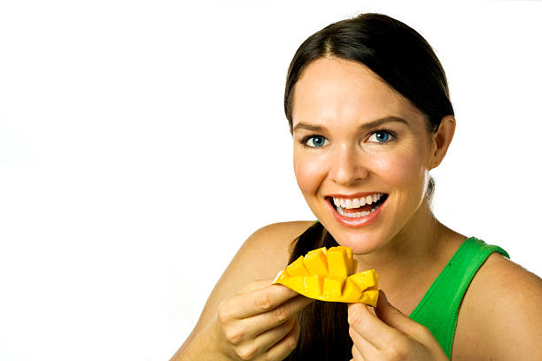 6,601 Eating Mango Stock Photos, Pictures & Royalty-Free Images - iStock