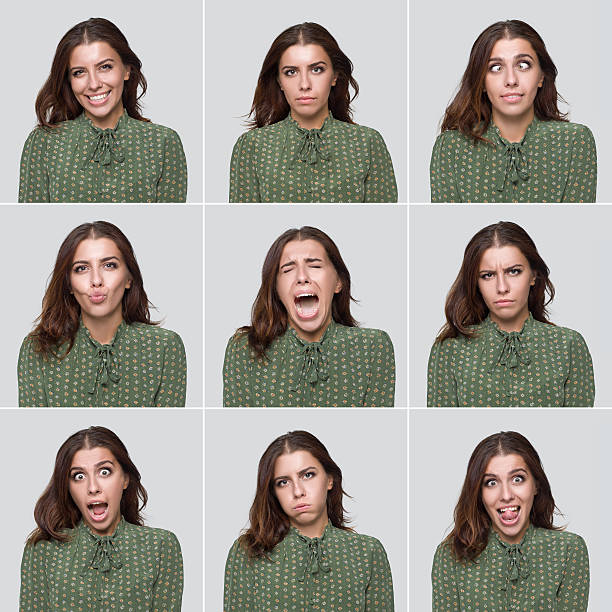 Young woman making various different facial expressions. Multiple close-up portraits of a young beautiful woman expressing different emotions and expressions, Studio Shot. Images taken with 50 Megapixel Hasselblad H5D 50C camera and developed from Raw.