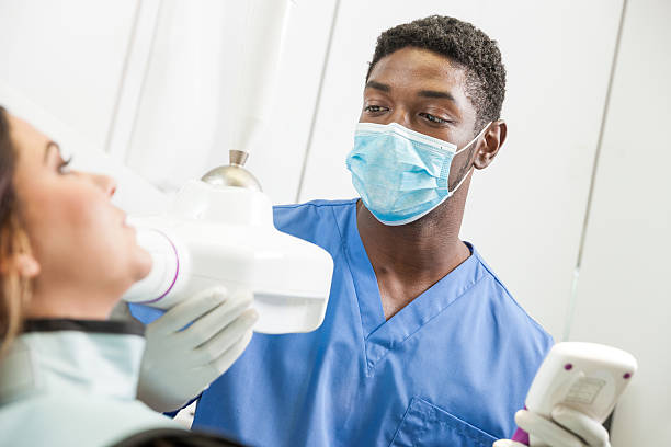 Young Black Dentist X-Rays Patient Teeth stock photo