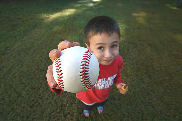 Young Boy with Baseball stock photo