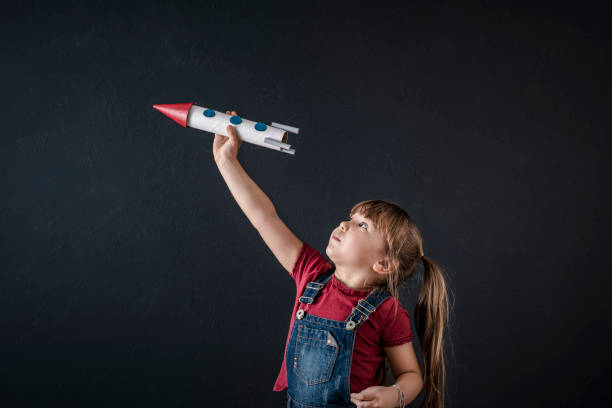 Young Business Girl with Rocket Pack stock photo