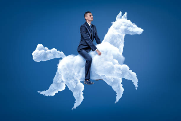 ung affärsman ridning white cloud horse på blå bakgrund - horse working bildbanksfoton och bilder