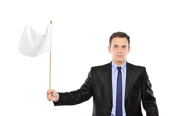 若いビジネスマン、ホワイトの旗を振る - 白旗 ストックフォトと画像