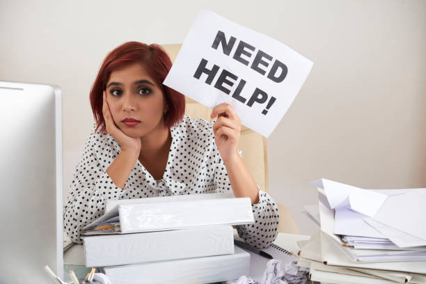 Young Businesswoman Needs Help stock photo