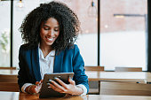 istock Young businesswoman using digital tablet 1332113666