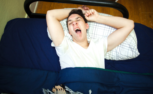 Young College Student Struggles Waking Up Early In Morning Young College Student Struggles Waking Up Early In Morning
