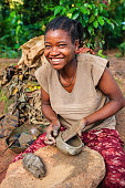 istock Young Ethiopian woman making pottery 1366446535