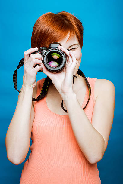 Young female photographer stock photo