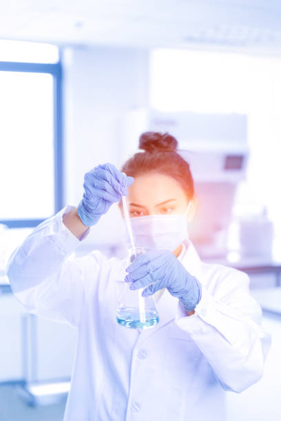 Young female scientist working in laboratory stock photo