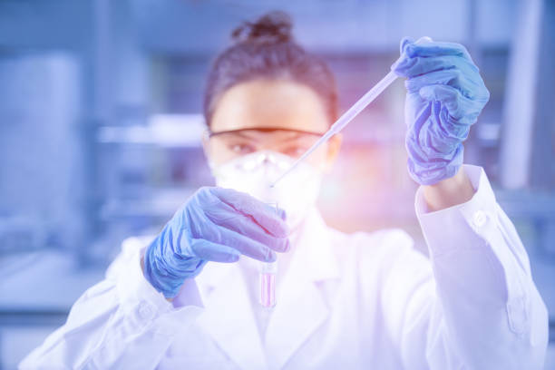 Young female scientist working in the laboratory stock photo
