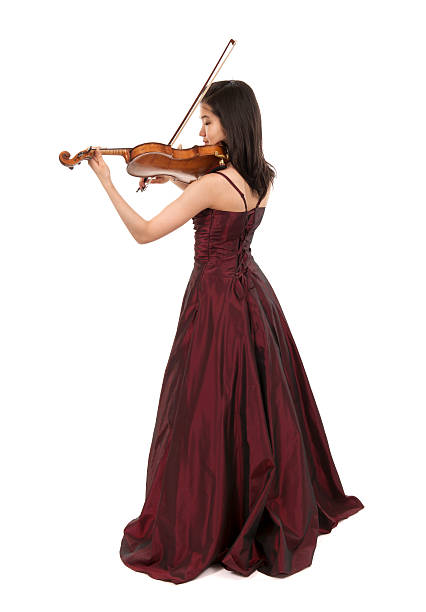 young female violin player stock photo