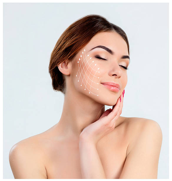 Young female with clean fresh skin The young female with clean fresh skin, antiaging and thread lifting concept human skin stock pictures, royalty-free photos & images
