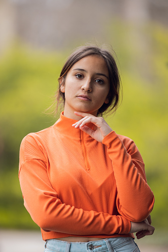 Young Girl portrait in Orange shirt
