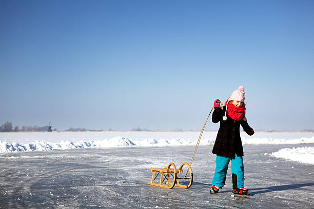 Young girl ice-skating Fun stock photo