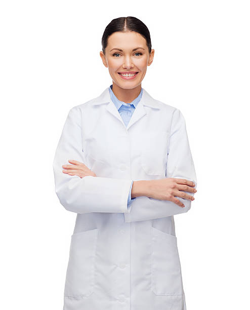 Young happy female doctor with her arms crossed healthcare and medicine concept - smiling female doctor lab coat stock pictures, royalty-free photos & images