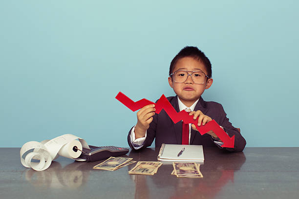 Young Japanese Boy Is Losing Money stock photo
