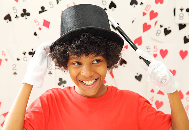 young magician stock photo