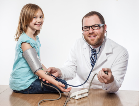 Male Neurologist Doctor Inspecting Young Female Patient`s 