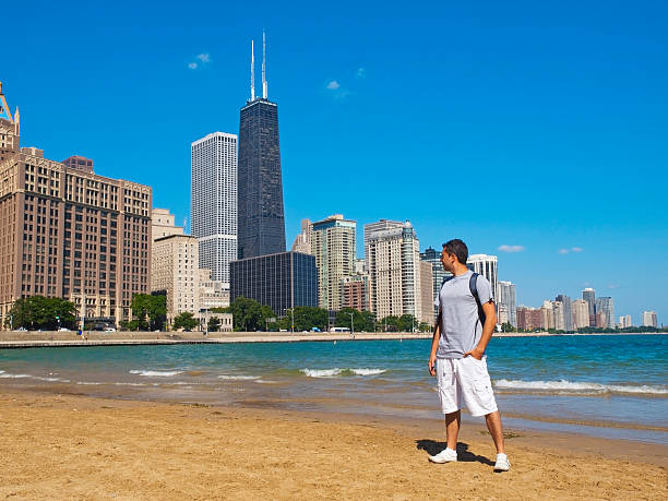 Young man admiring the Chicago Skyline stock photo
