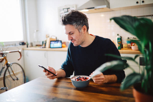 young man having a healthy breakfast stock photo