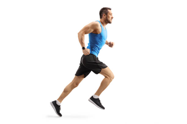 Young man in sportswear running Full length shot of a young man in sportswear running isolated on white background marathon photos stock pictures, royalty-free photos & images