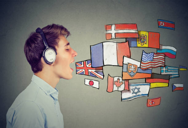 Young man learning different languages stock photo