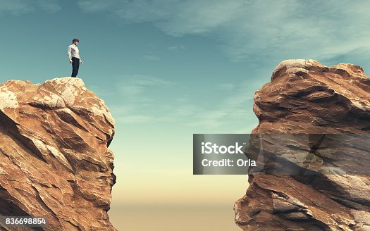 istock Young man on a rock 836698854