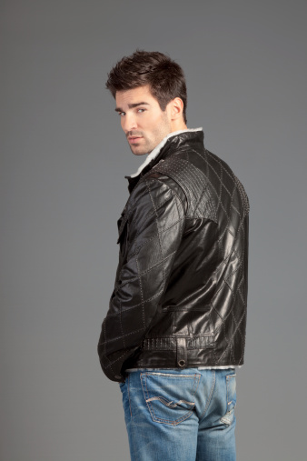 Young Man Posing With Leather Jacket Stock Photo - Download Image Now ...