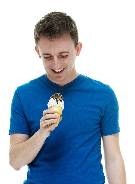 Man Eating Ice Cream Cone Stock Photos, Pictures & Royalty ...